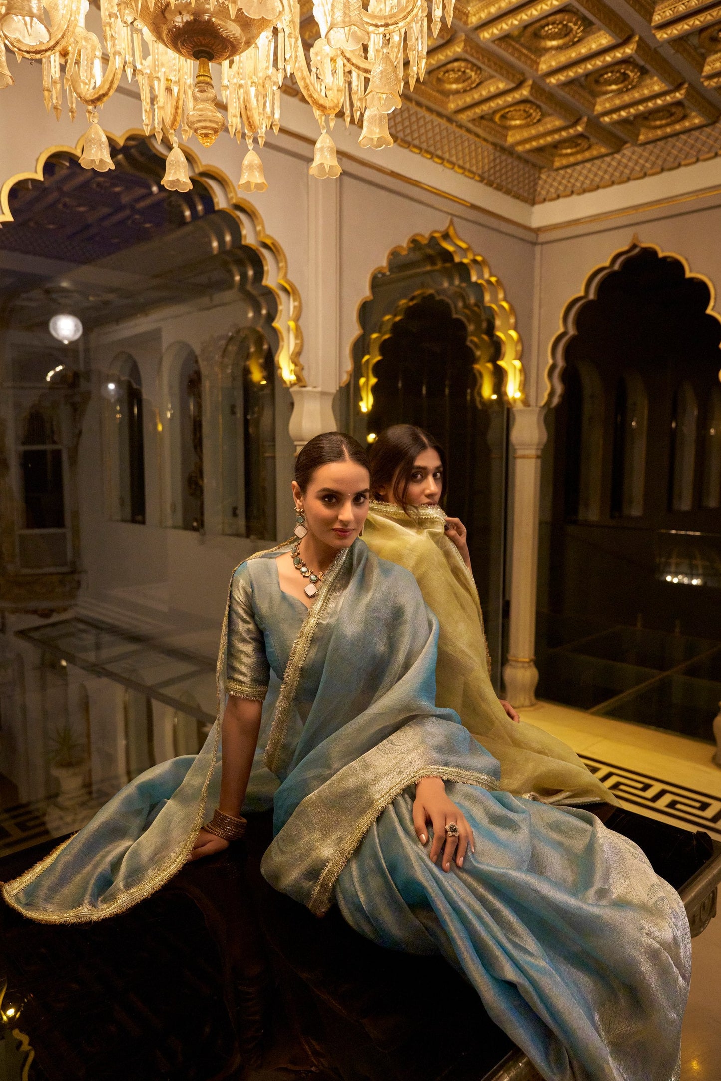 Model draped in Gold tissue shimmer saree with zari weaving and sequins lace border – RANI SA Collection