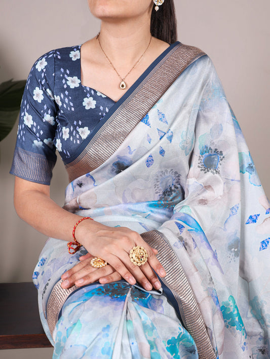Model draped in Sky Blue Tussar silk saree with floral print and viscose border – Tussar Silk Collection